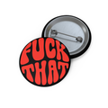 Round pinback button with bold red “F*ck That” text on black background, glossy finish and steel clasp.
