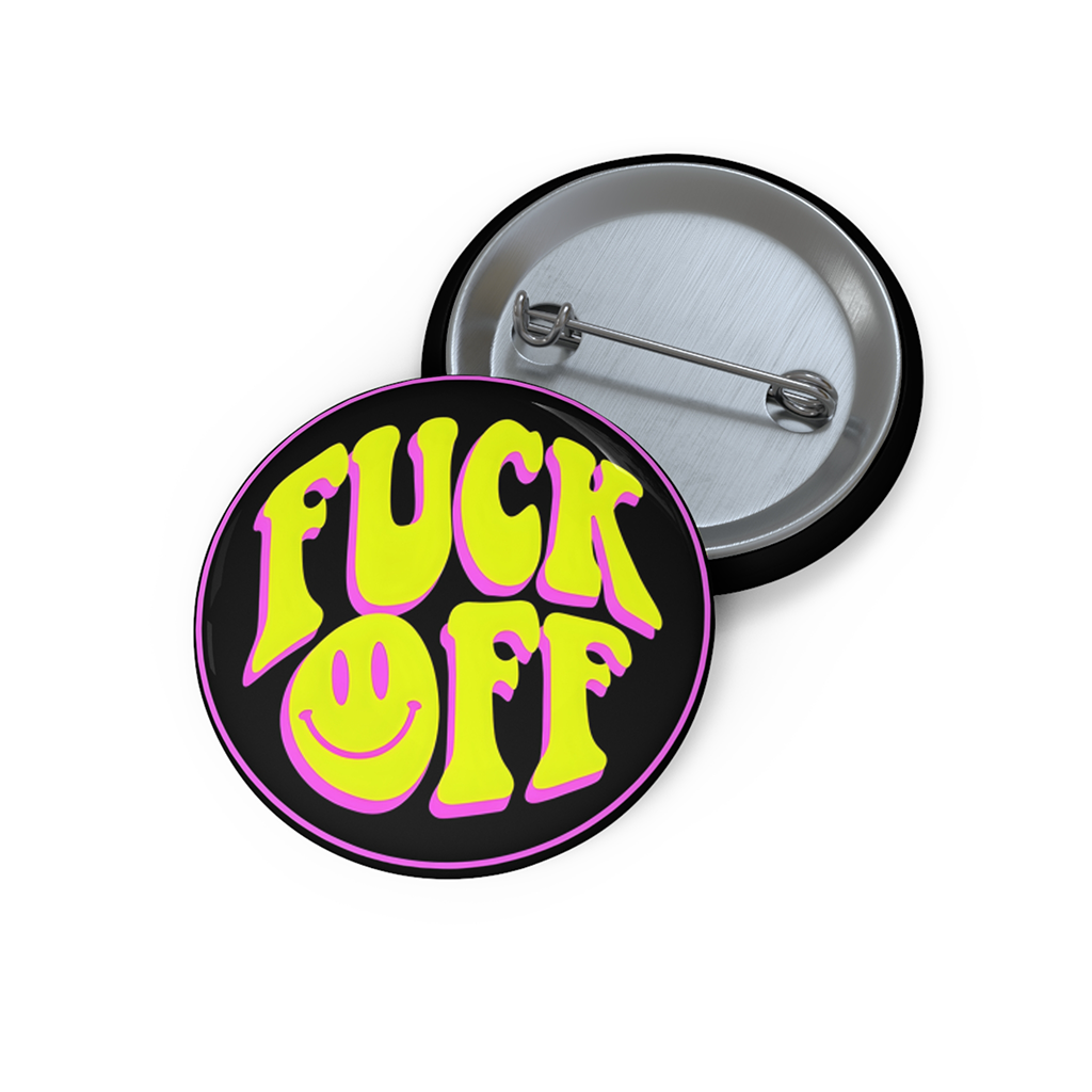 Neon yellow and pink “F*ck Off” pin with a twisted smiley face and black background, glossy finish and sharp edge.